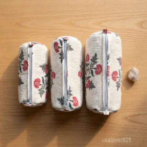 Set of 3 White Flower Print Quilted Cotton Toiletry Bags nesting set showing the traditional botanical artisan design and secure zipper fastenings.