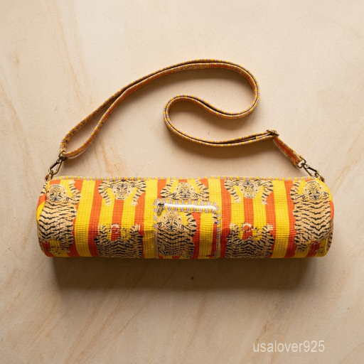 Woman walking to a workout studio carrying a Wild Tiger Striped Quilted Cotton Yoga Mat Bag comfortably as a crossbody sling.