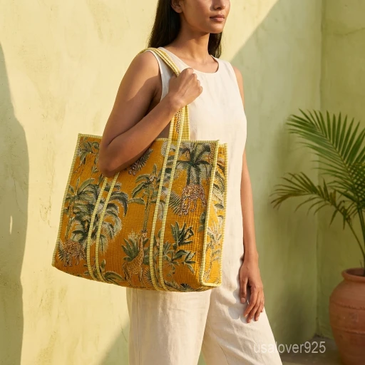 Yellow Animal Print Quilted Indian Cotton Tote Bag with large shoulder handles showing the traditional wild cat hand block print design.