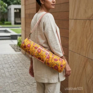 Close-up of the secure top zipper closure, premium wide-width strap, and clean hand block style patterns on a yellow cotton yoga bag.
