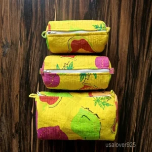 Set of 3 Yellow Fruit Print Quilted Cotton Toiletry Bags nesting set showing the traditional artisan botanical design and secure zippers with fabric pull tabs.