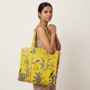 Yellow Jungle Print Quilted Cotton Tote Bag showing the traditional hand block print artisan design with the spacious extra-large main compartment opening and reinforced double shoulder handles.