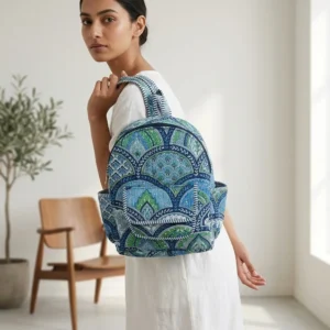Blue Floral Quilted Cotton Backpack Bag showing the spacious vertical rucksack design with the handcrafted indigo block print pattern and adjustable shoulder straps.