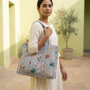 Blue Floral Quilted Tote Bag showing the traditional hand block print artisan design with the spacious 18x18 main compartment opening and reinforced double padded shoulder handles.