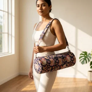 Blue Kalamkari Quilted Cotton Yoga Mat Bag showing the cylindrical crossbody carrier design with the handcrafted ethnic block print pattern and full-length zipper closure.