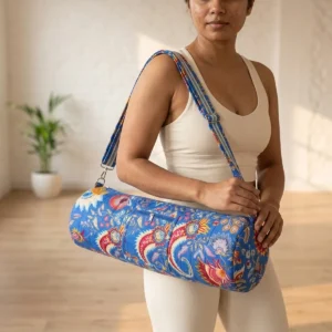 Blue Kalamkari Quilted Cotton Yoga Mat Bag showing the cylindrical crossbody carrier design with the handcrafted ethnic block print pattern and full-length zipper closure.