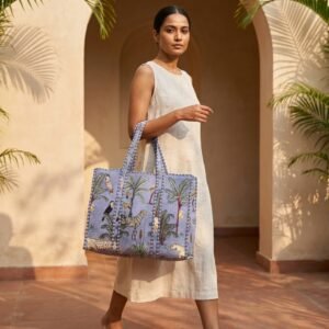 Blue Safari Quilted Tote Bag showing the traditional wild cat hand block print artisan design with the spacious 18x18 main compartment opening and reinforced double padded shoulder handles.