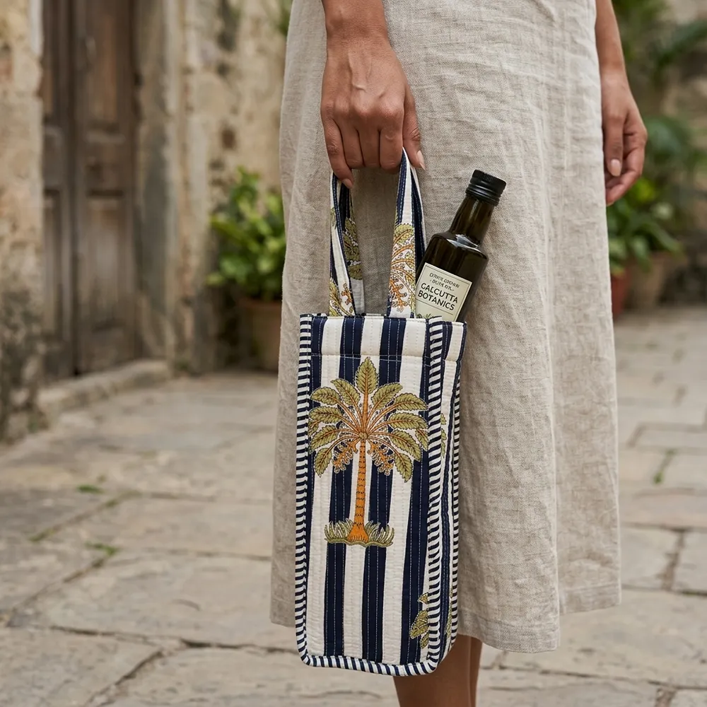 Blue Stripe Quilted Water Bottle Bag showing the thick hand-quilted cotton textile structure and comfortable top carry handle with a travel flask inside.