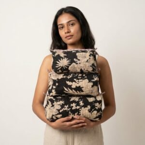Floral Quilted Toiletry Bag Set showing the nested 3-piece handmade travel pouch bundle with the traditional floral hand block print design and secure zipper tracks.