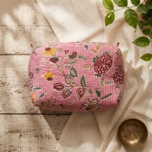 Close-up of the largest case in the Floral Quilted Toiletry Bag Set opened to reveal the clean protective inner lining, smooth zipper track, and soft quilted horizontal stitching texture.
