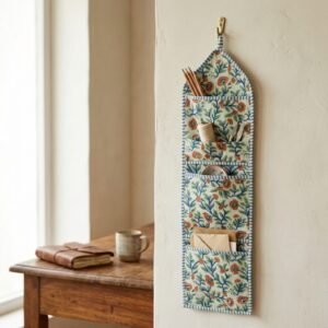 Close-up of the handcrafted botanical print detailing, dense quilted stitching texture lines, robust pocket seam attachments, and clean pocket opening on the cotton pocket storage.