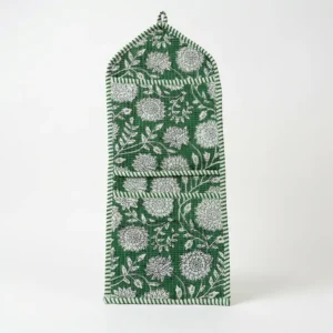 Close-up of the handcrafted green botanical print detailing, dense quilted stitching texture lines, robust pocket seam attachments, and clean pocket opening on the cotton pocket storage.