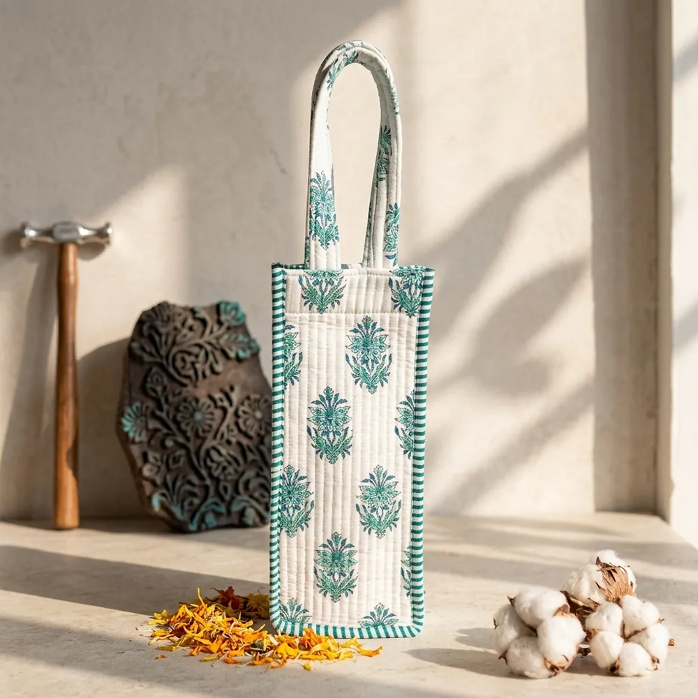 Green Floral Quilted Water Bottle Bag showing the thick hand-quilted cotton textile structure and comfortable top carry handle with a travel flask inside.