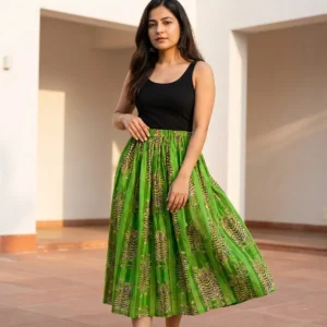 Green Tiger Printed Cotton Maxi Skirt displaying the flowing flared silhouette and handcrafted exotic wilderness block print pattern on an outdoor model.