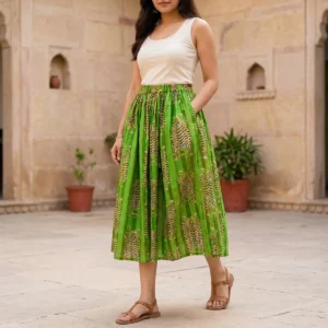 Green Tiger Printed Cotton Maxi Skirt displaying the flowing flared silhouette and handcrafted exotic wilderness block print pattern on an outdoor model.