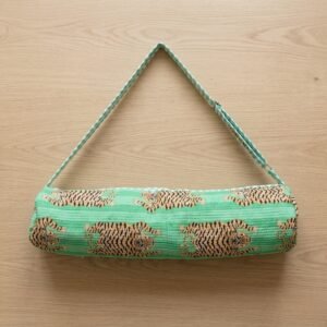 Close-up of the handcrafted exotic green cat print detail, dense quilted stitching texture lines, heavy-duty border trim, and clean inner layout on an Indian cotton Pilates carrier bag.