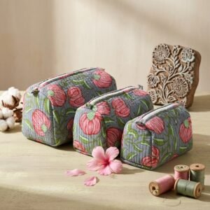 Grey Pink Floral Quilted Toiletry Bag Set showing the nested 3-piece handmade travel pouch bundle with the traditional charcoal and rose floral hand block print design and secure zipper tracks.