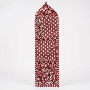 Close-up of the handcrafted maroon geometric print detailing, dense quilted stitching texture lines, robust pocket seam attachments, and clean pocket opening on the cotton pocket storage.