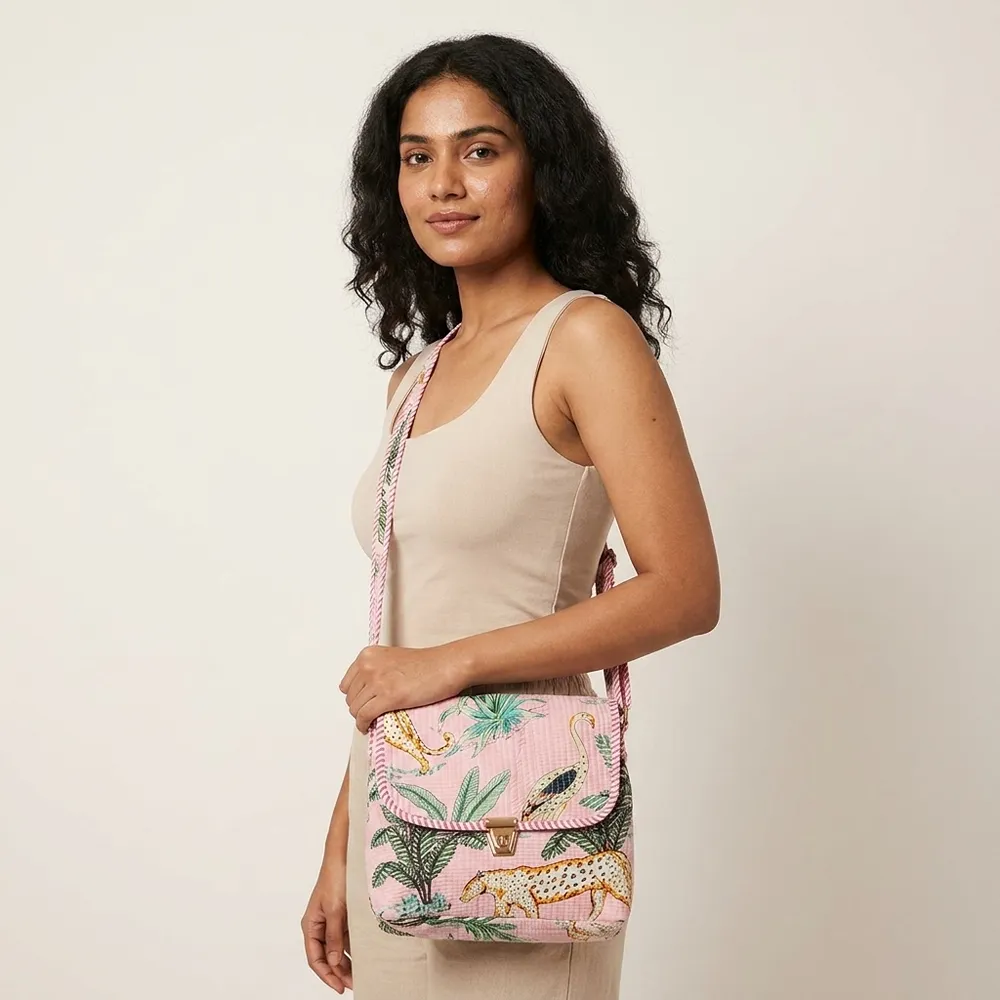 A travel scene featuring a person wearing the quilted cotton sling purse across a linen outfit, highlighting its lightweight everyday carrying convenience and bohemian style.