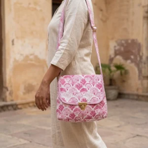 Pink Scallop Quilted Crossbody Bag showing the compact hands-free shoulder purse design with the handcrafted geometric block print pattern and long crossbody strap.