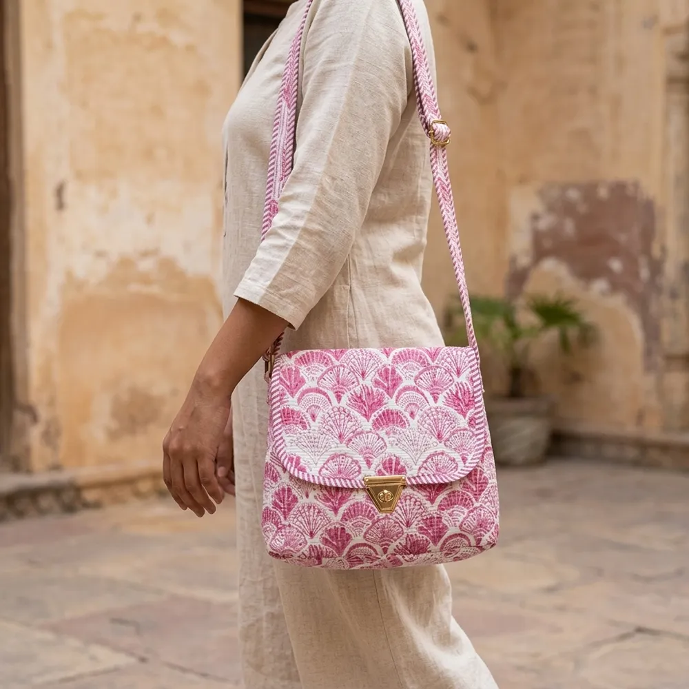 Pink Scallop Quilted Crossbody Bag showing the compact hands-free shoulder purse design with the handcrafted geometric block print pattern and long crossbody strap.