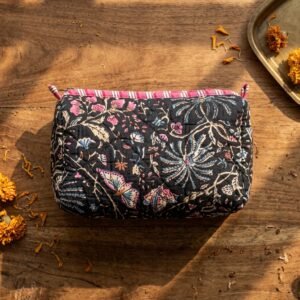 Close-up of the deep storage slots on the Quilted Toiletry Bag Set, highlighting the dense horizontal quilting stitch rows, heavy-duty fabric borders, and spacious pocket entry clearance.