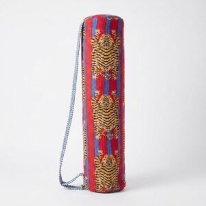 Close-up of the handcrafted exotic crimson and indigo cat print detail, dense quilted stitching texture lines, heavy-duty border trim, and clean inner layout on an Indian cotton Pilates carrier bag.