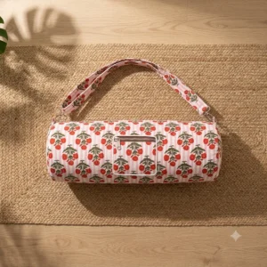 Close-up of the handcrafted pink striped border detailing, dense quilted tracking lines, robust zipper attachment, and durable cross-stitched shoulder strap joints on the fitness tote.