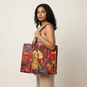 Red Frida Quilted Shoulder Tote Bag showing the traditional hand block print artisan design with the spacious 19-inch wide open-top main compartment and reinforced double shoulder handles.