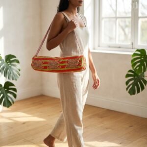 Red Green Tiger Quilted Yoga Mat Bag displaying the traditional wild cat hand block print artisan design with the spacious 27x6 main barrel zipper track open and reinforced wide shoulder sling handle.