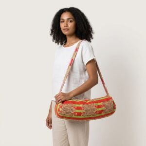 Close-up of the handcrafted exotic crimson and emerald cat print detail, dense quilted stitching texture lines, heavy-duty border trim, and clean inner layout on an Indian cotton Pilates carrier bag.