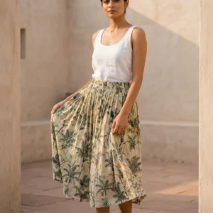 A beachside resort setting showing the block printed casual resort wear skirt paired with sandals, highlighting its relaxed fit and elegant bohemian holiday style.
