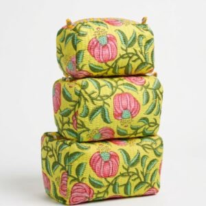Close-up of the largest case in the Set of Three Quilted Cotton Makeup Bags opened to reveal the clean waterproof plastic inner lining, smooth zipper track, and protective horizontal stitching texture.