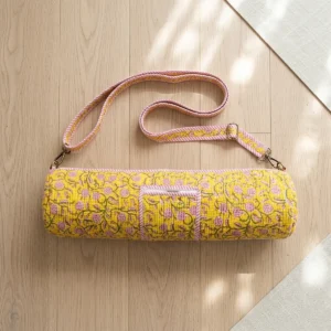 Close-up of the handcrafted pink striped border detailing, dense quilted tracking lines, robust zipper attachment, and durable cross-stitched shoulder strap joints on the fitness handbag.