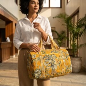Yellow Safari Quilted Cotton Duffel Bag showing the traditional hand block print artisan design with the spacious main compartment opening and reinforced double carry handles.