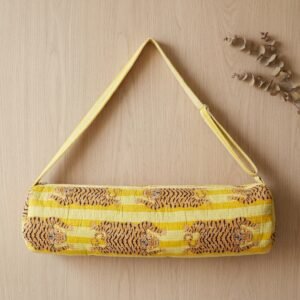 Close-up of the handcrafted yellow wild cat stripe print detailing, dense quilted stitching texture lines, robust handle strap attachments, and secure opening layout on an Indian cotton Pilates carrier bag.