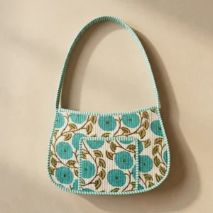 Handmade quilted cotton shoulder bag with turquoise floral botanical print